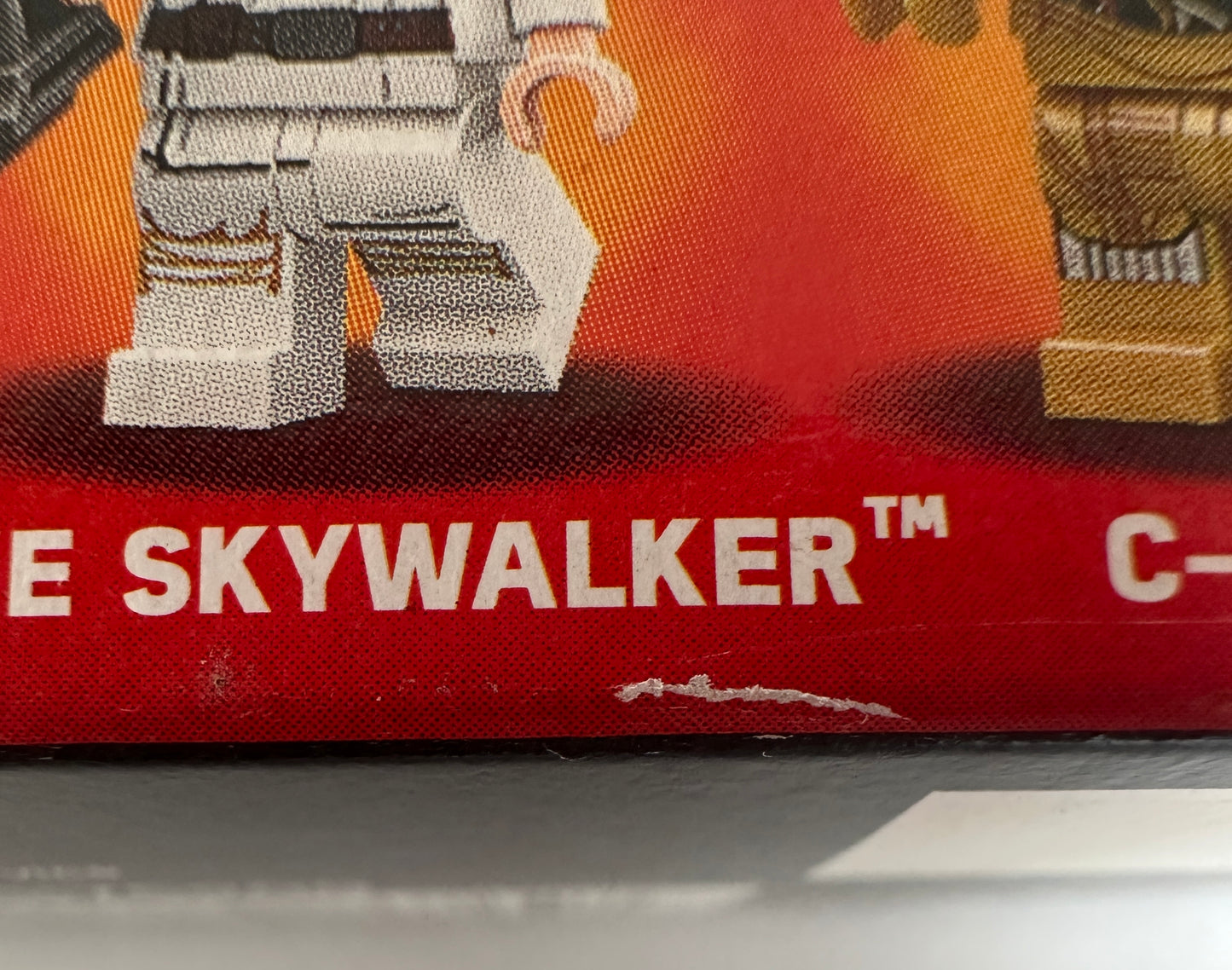 Close-up of a toy packaging with 'The Skywalker' text and a character figure.