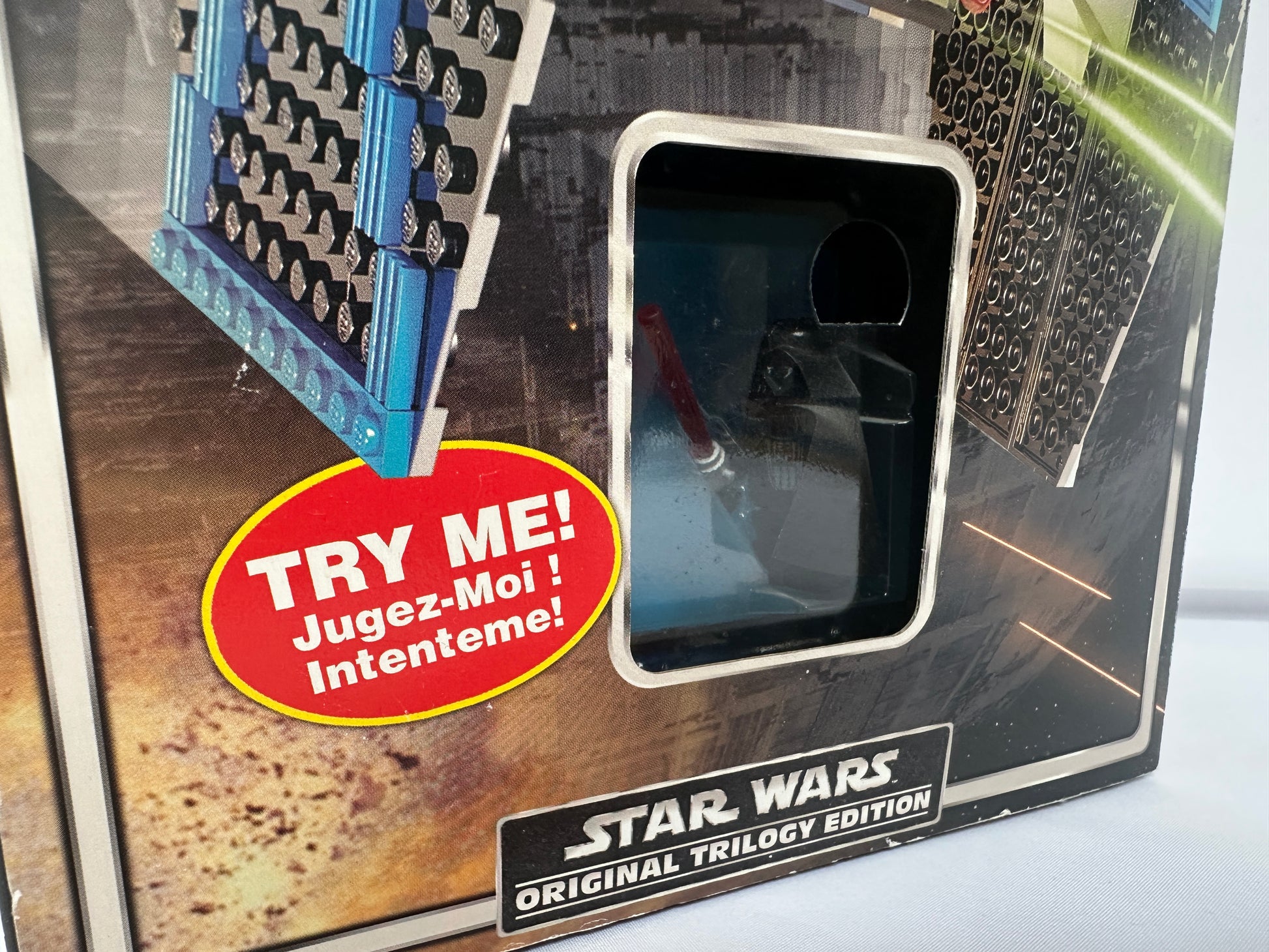 Star Wars toy packaging with a 'Try Me!' label on a white background
