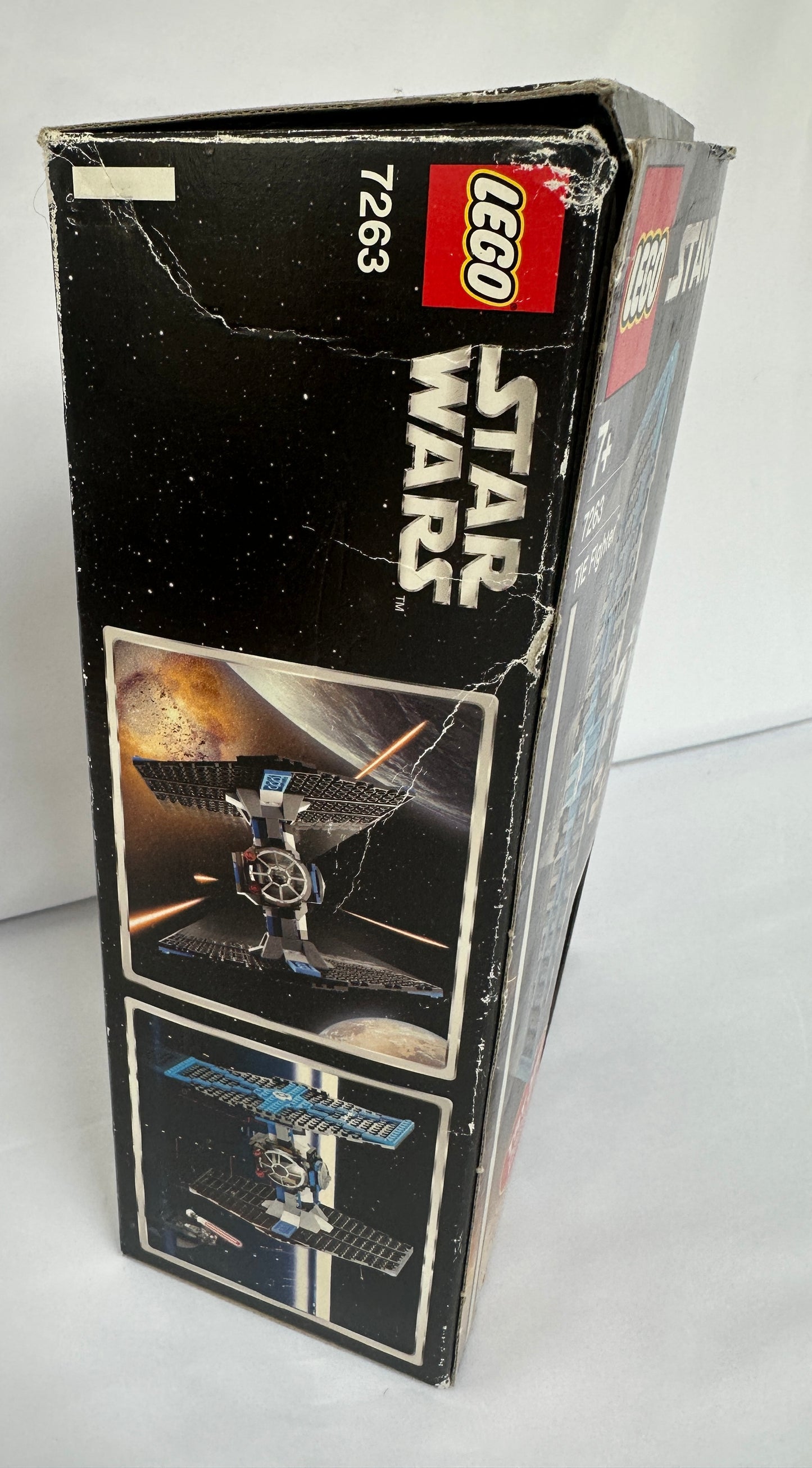 Vintage LEGO Star Wars box with visible wear on a white background