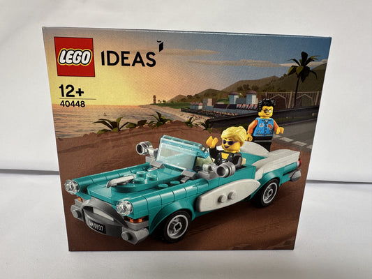 LEGO Ideas packaging with a vintage car and two figures on a beach scene background