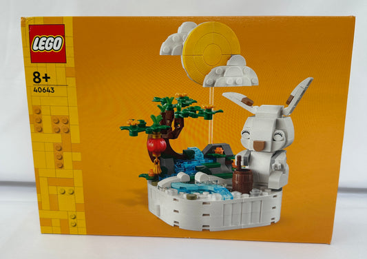LEGO set packaging with a rabbit figure and bonsai tree on an orange background