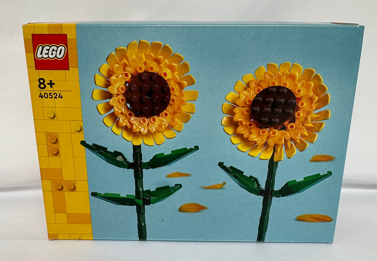 LEGO sunflower set packaging with two sunflowers on a light blue background