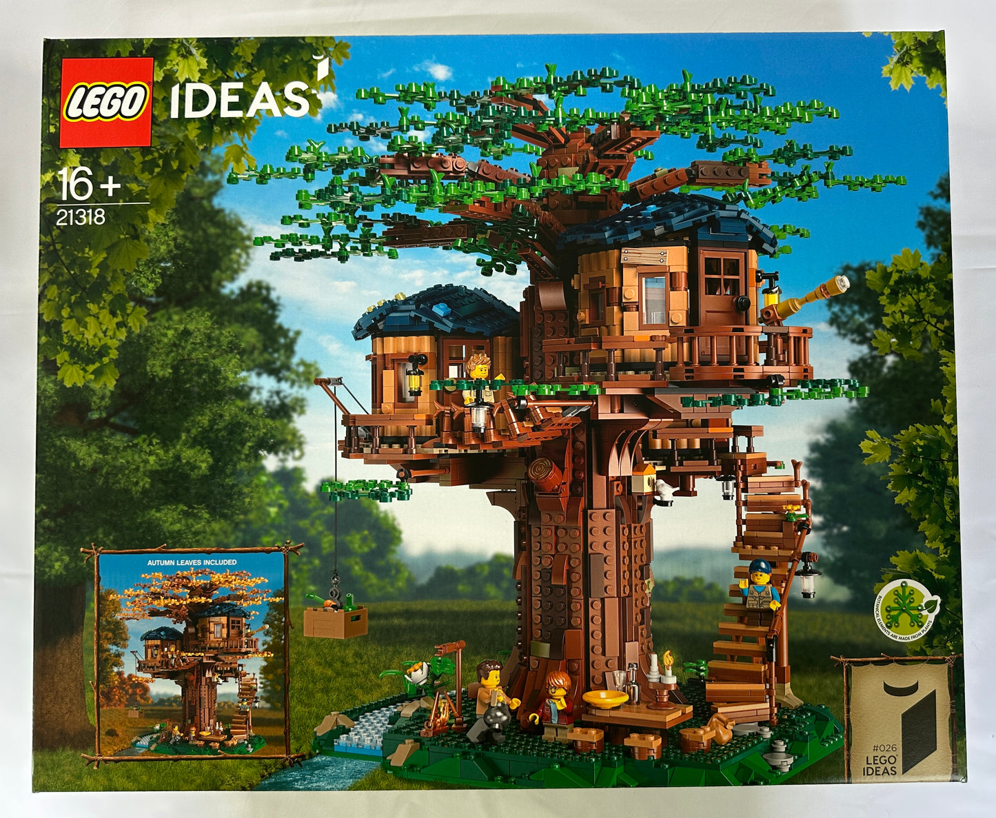 LEGO Ideas treehouse set packaging with detailed treehouse model on a scenic background
