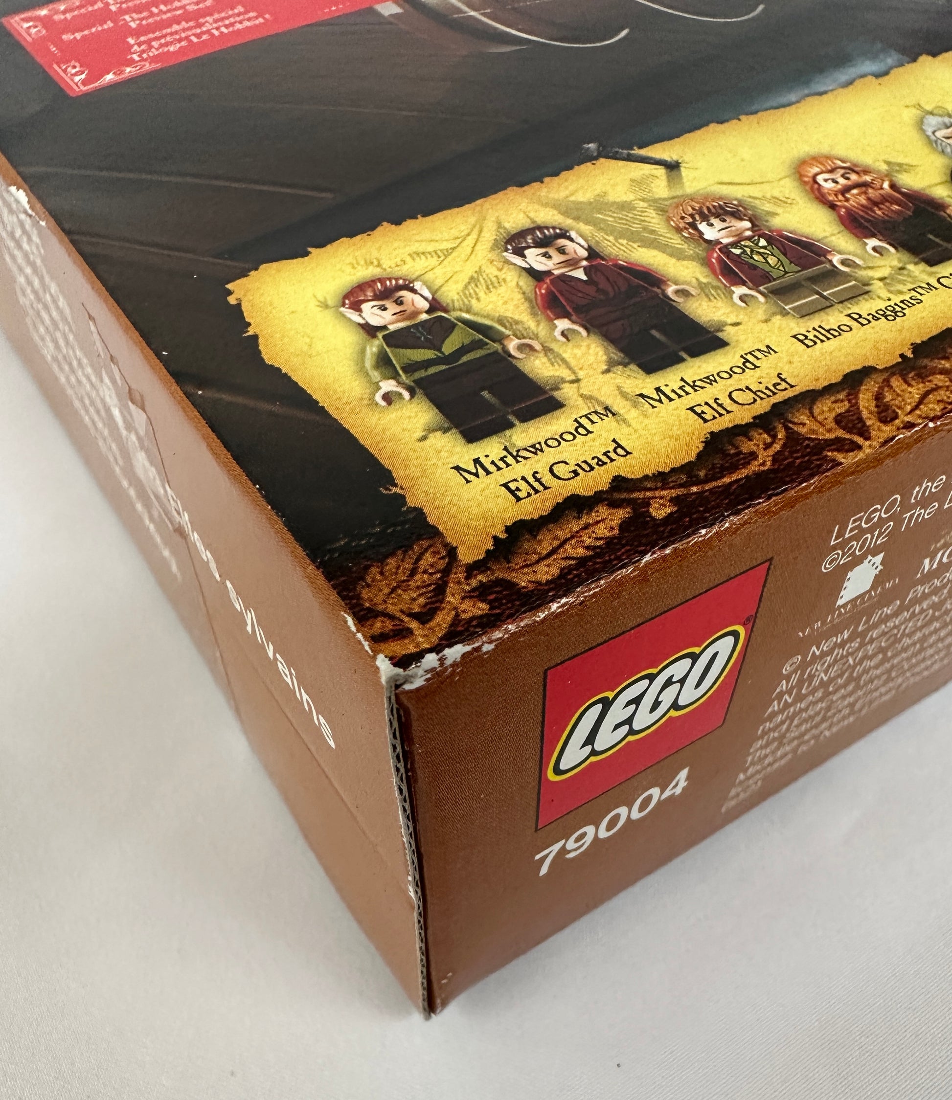 Close-up of a LEGO box with character illustrations and branding.