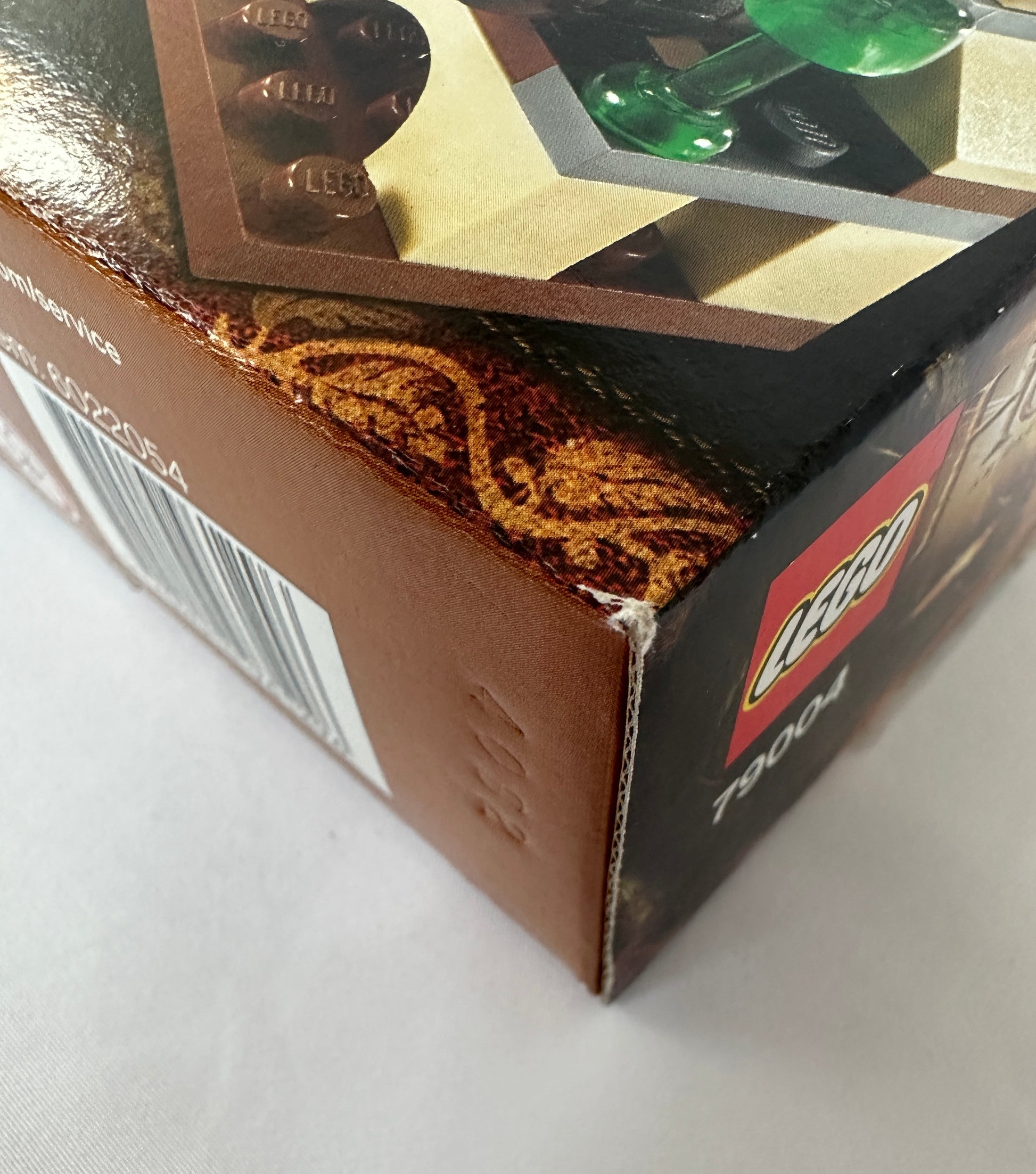 Close-up of a LEGO box with packaging details on a white background
