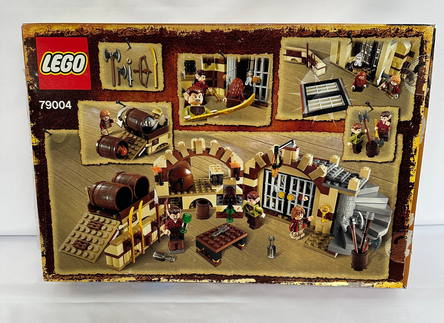 LEGO 79004 set packaging with various elements and figures on a white background