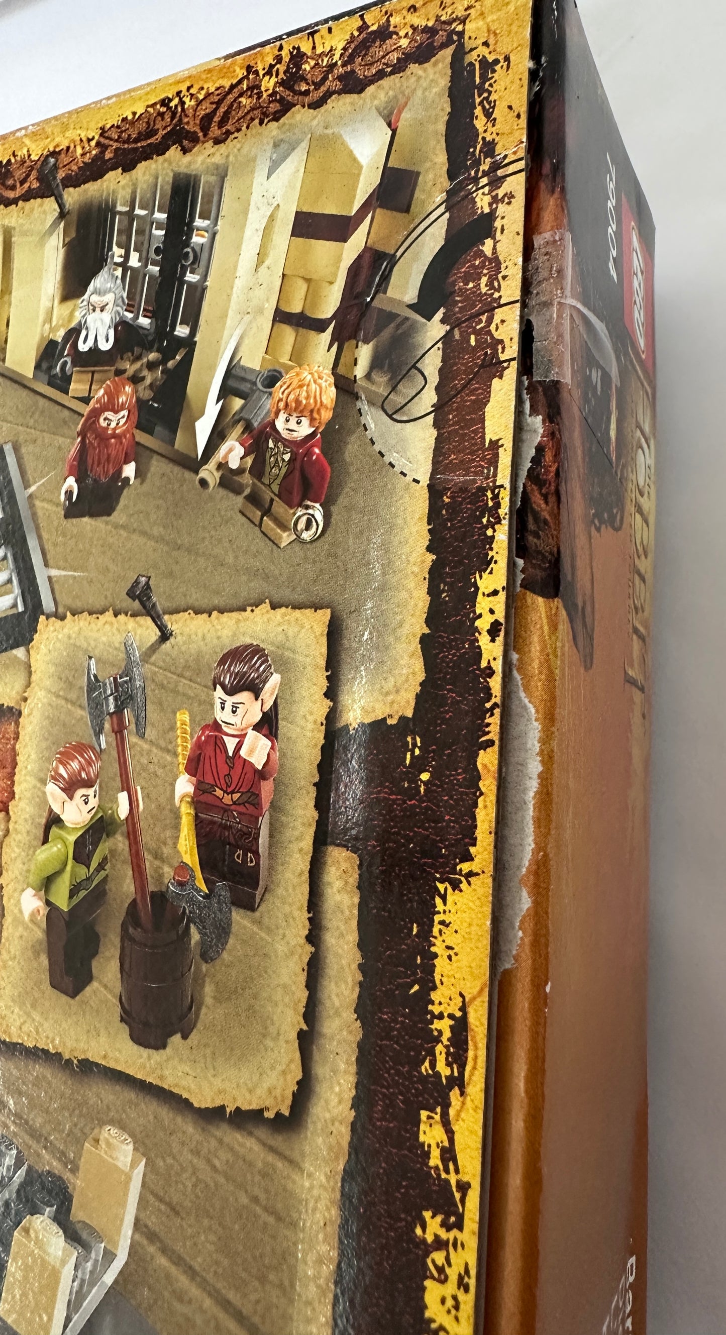 Close-up of a toy box with figurines on a textured surface