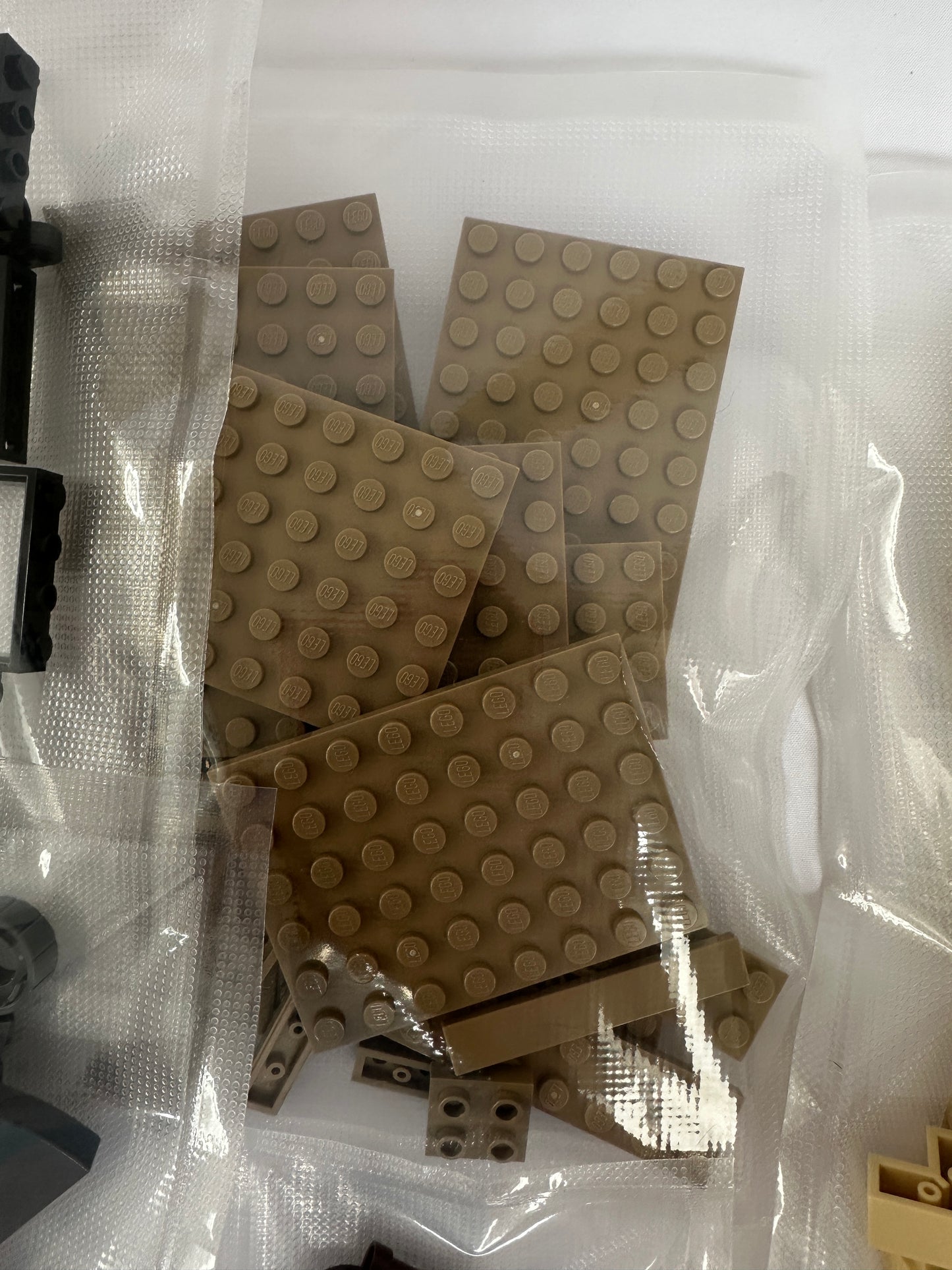 Brown building blocks in a clear plastic bag