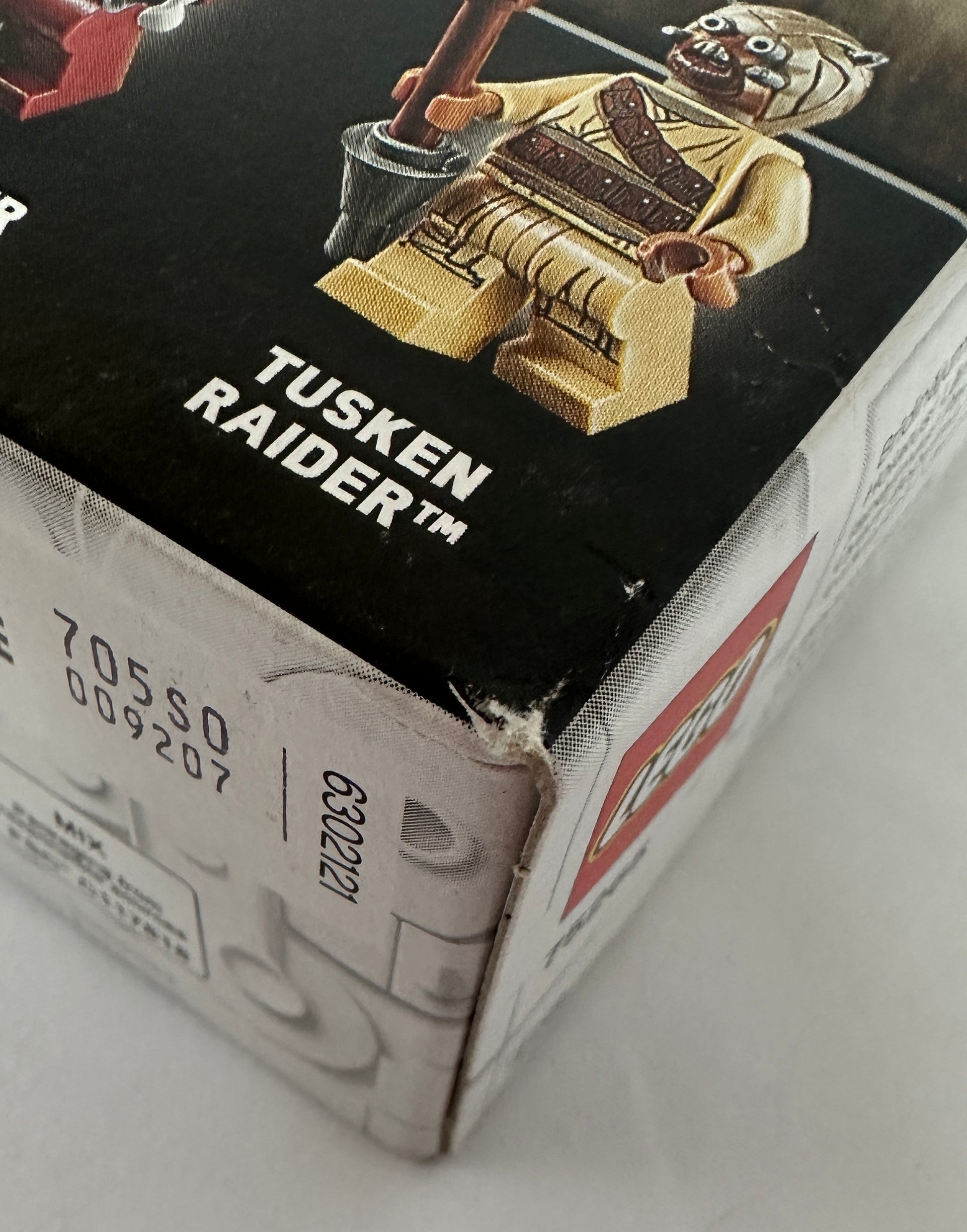 Box of a Tusken Raider toy figure with branding and product details.
