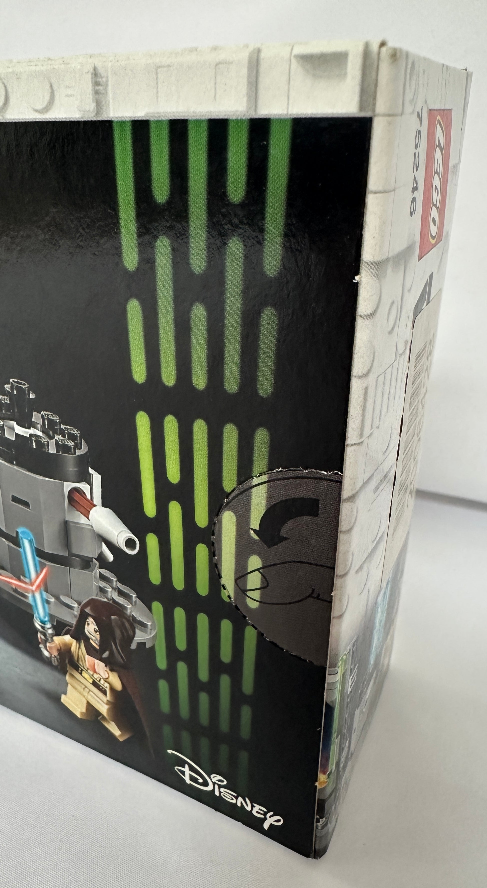 Toy packaging with character illustrations and Disney logo on a white background