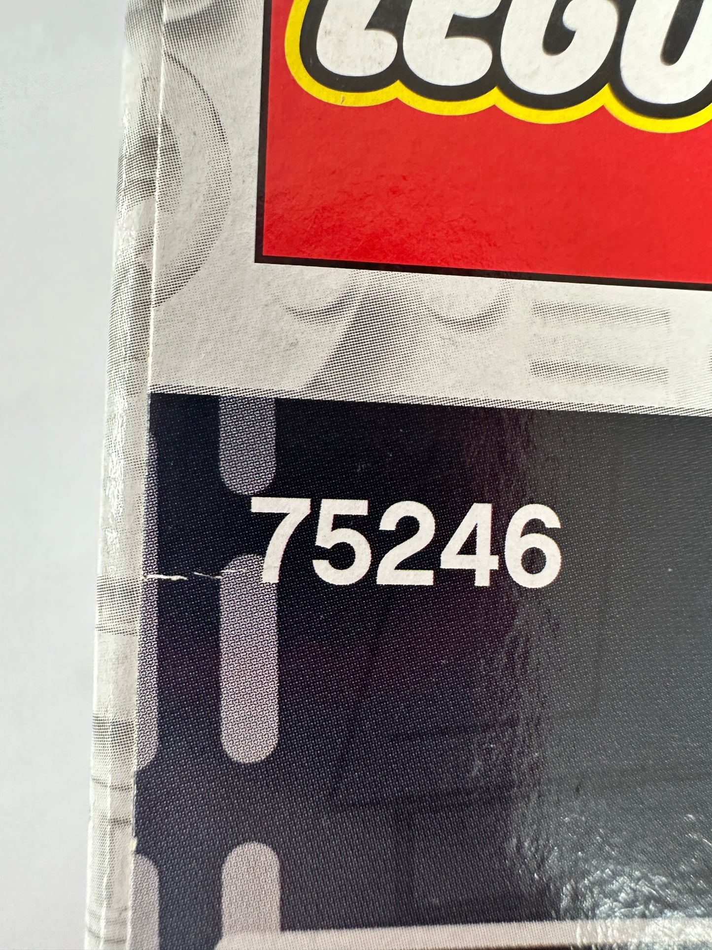 Close-up of a LEGO product with the number 75246 on a clear background