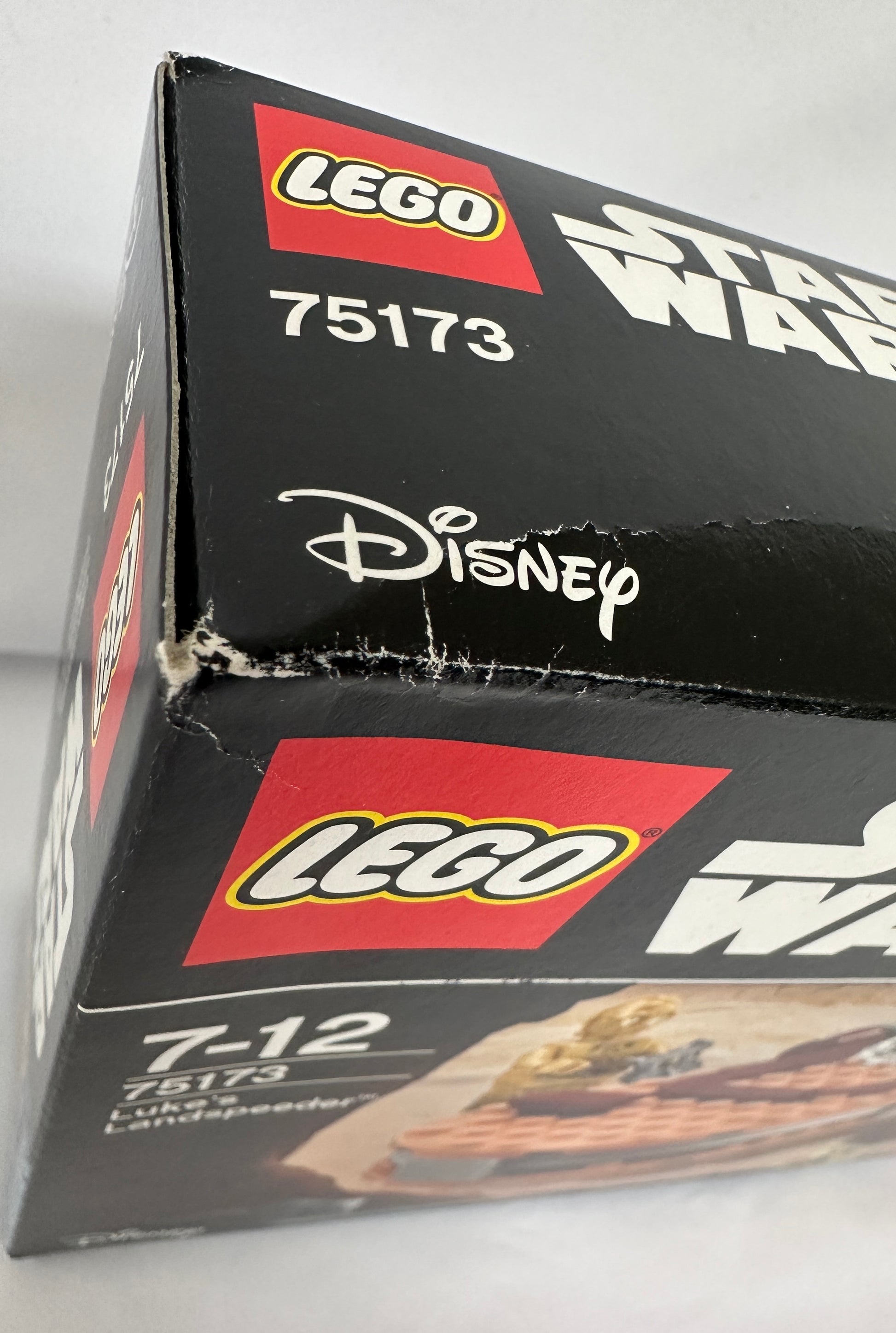 Close-up of a LEGO Star Wars packaging box with Disney branding.