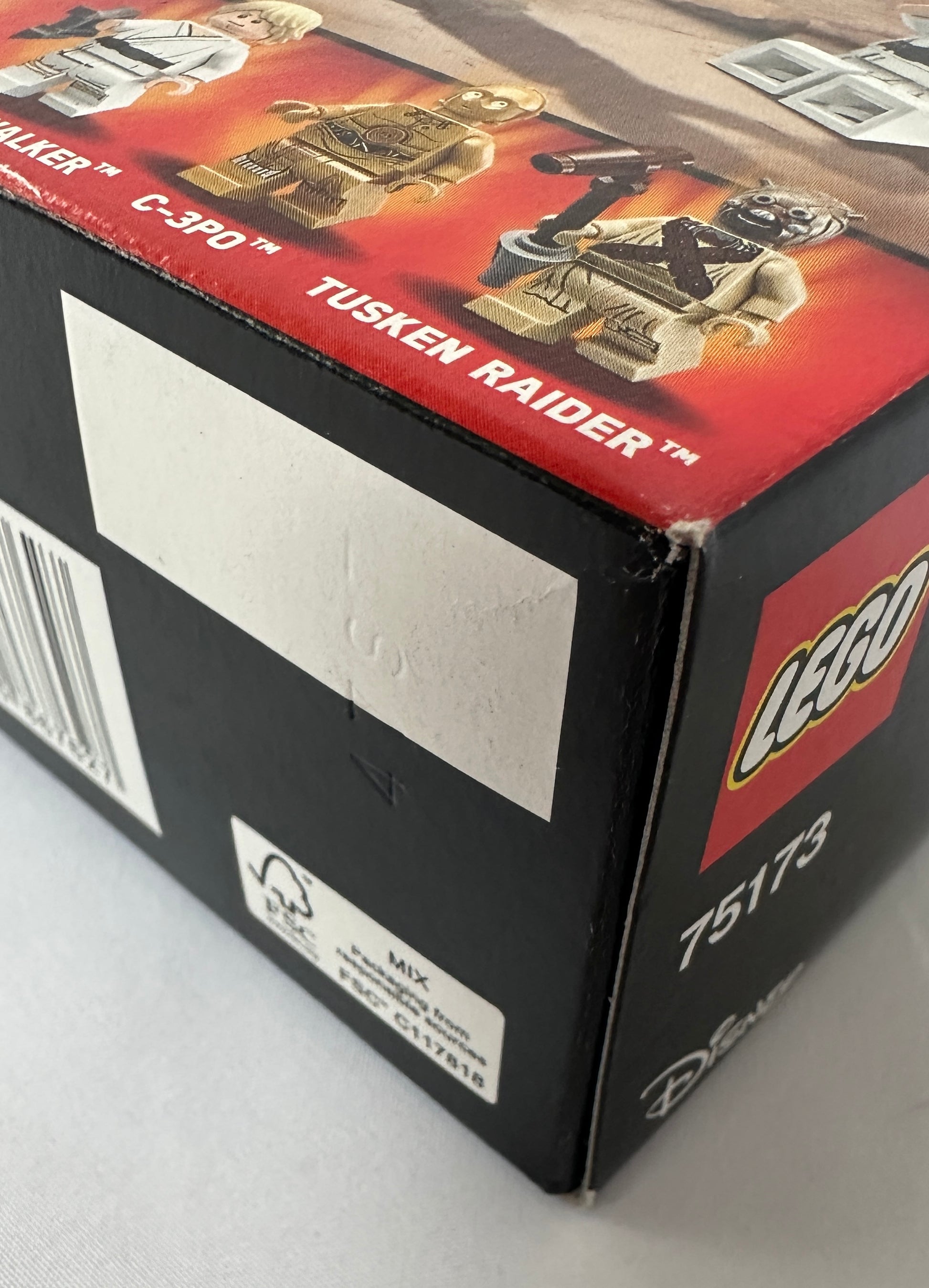 Close-up of a LEGO Tusken Raider box with branding and product details.