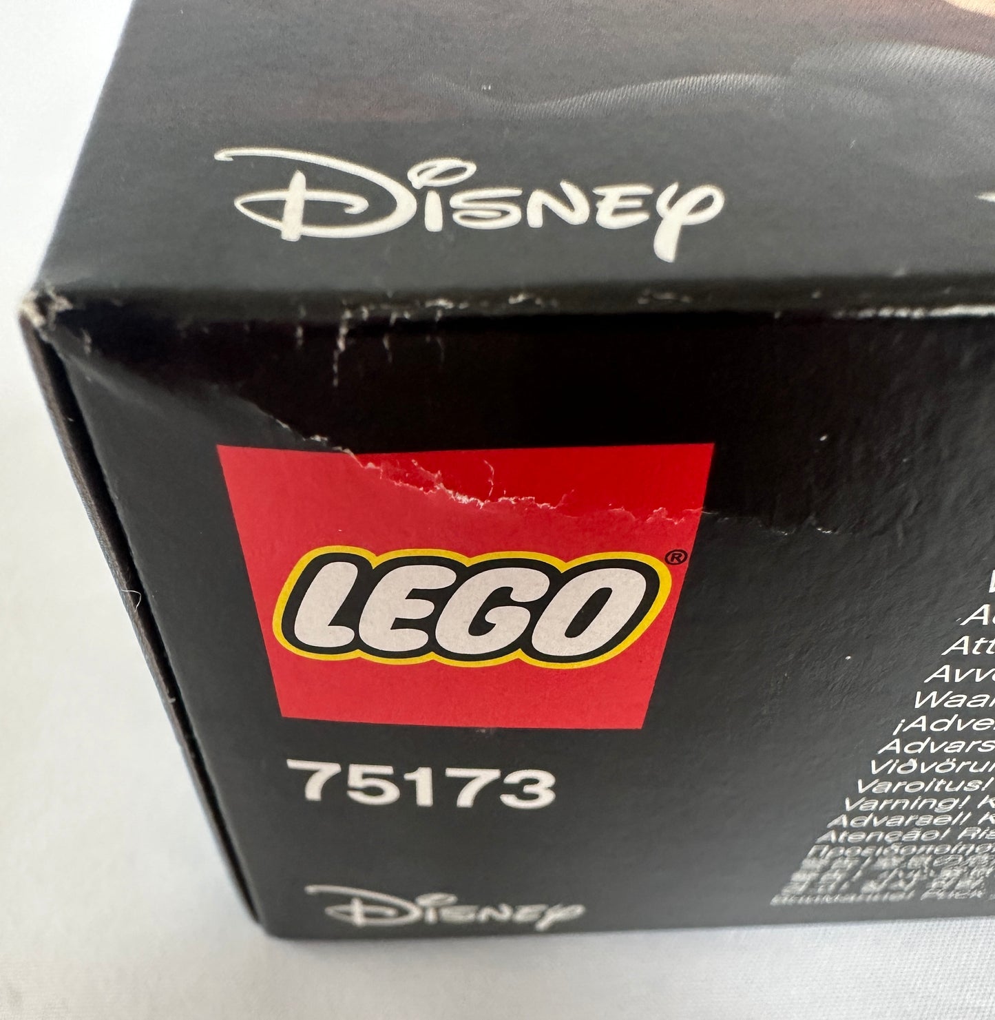Close-up of a LEGO Disney product packaging with the LEGO and Disney logos.