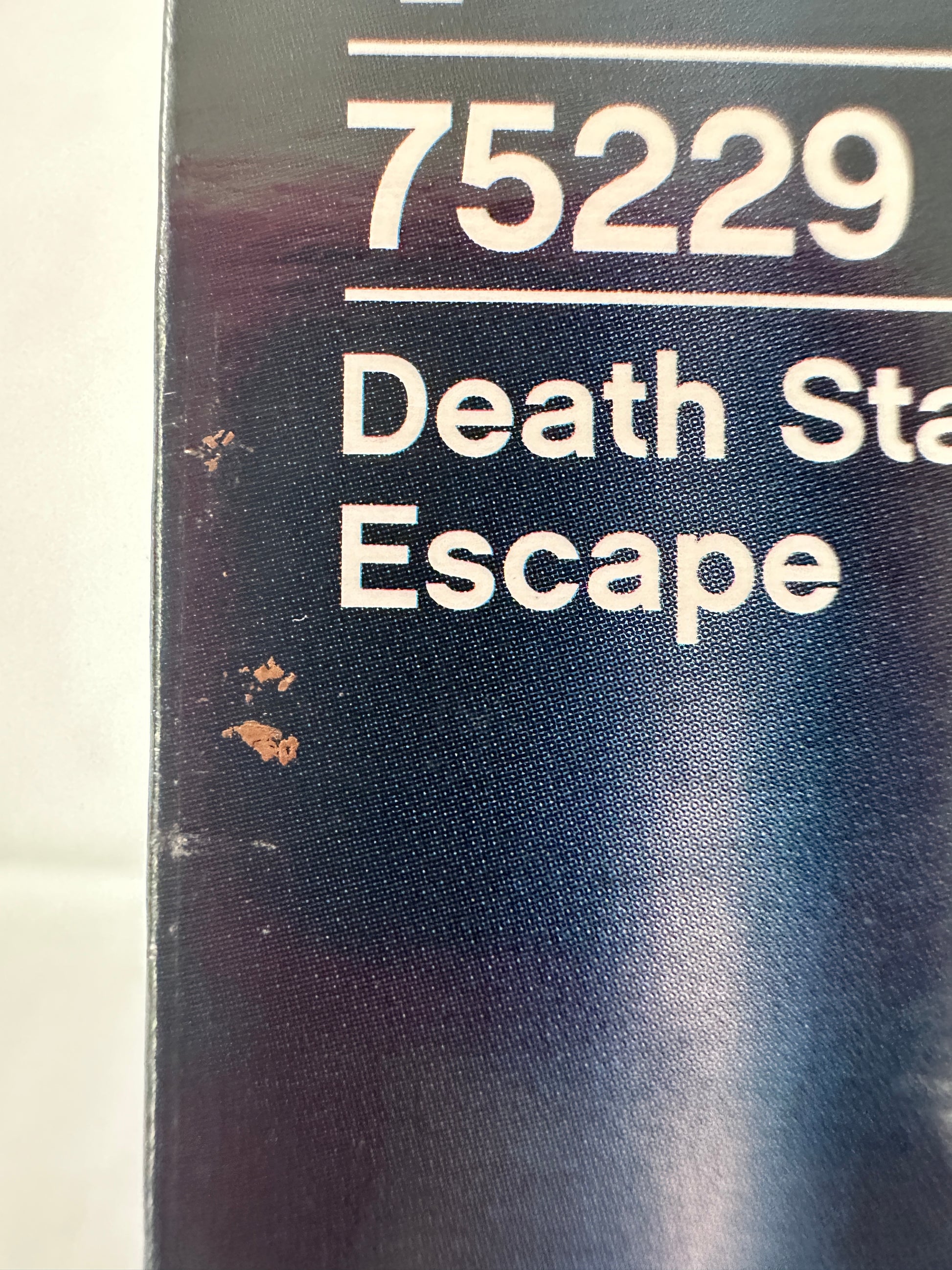 'Death Star Escape' with a visible ISBN number on a dark background