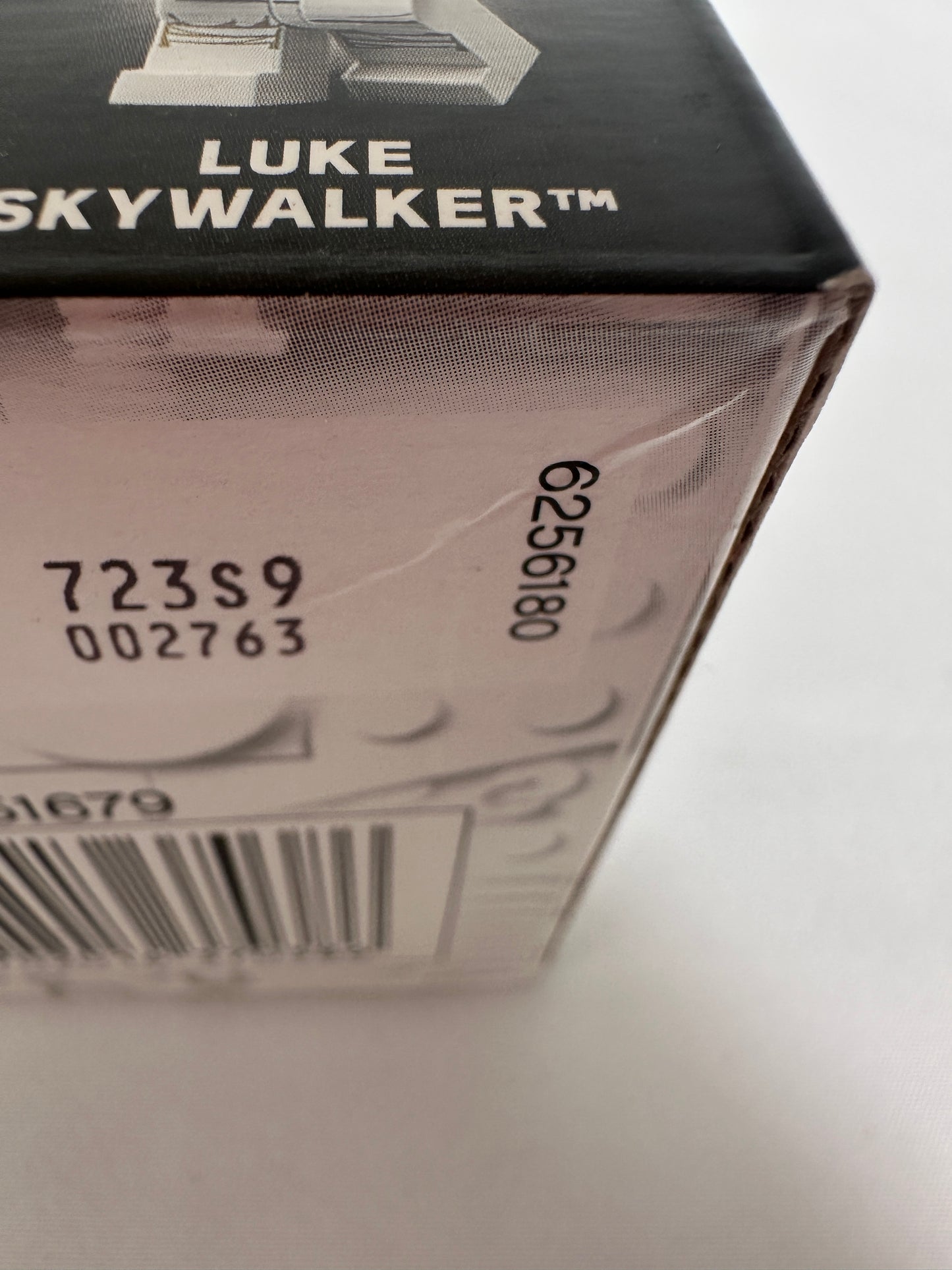 Product packaging with 'Luke Skywalker' branding and a barcode on a white background