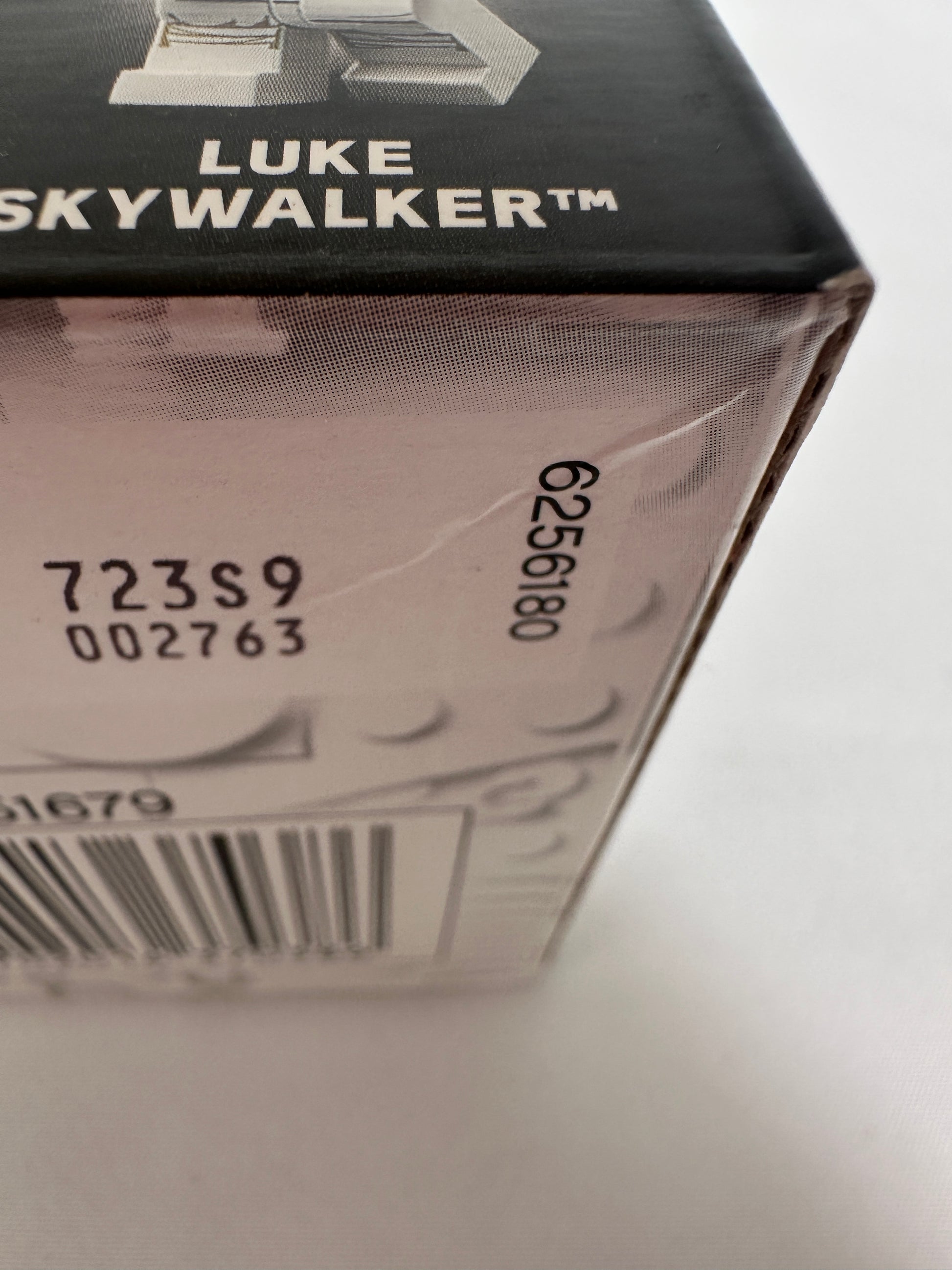 Product packaging with 'Luke Skywalker' branding and a barcode on a white background