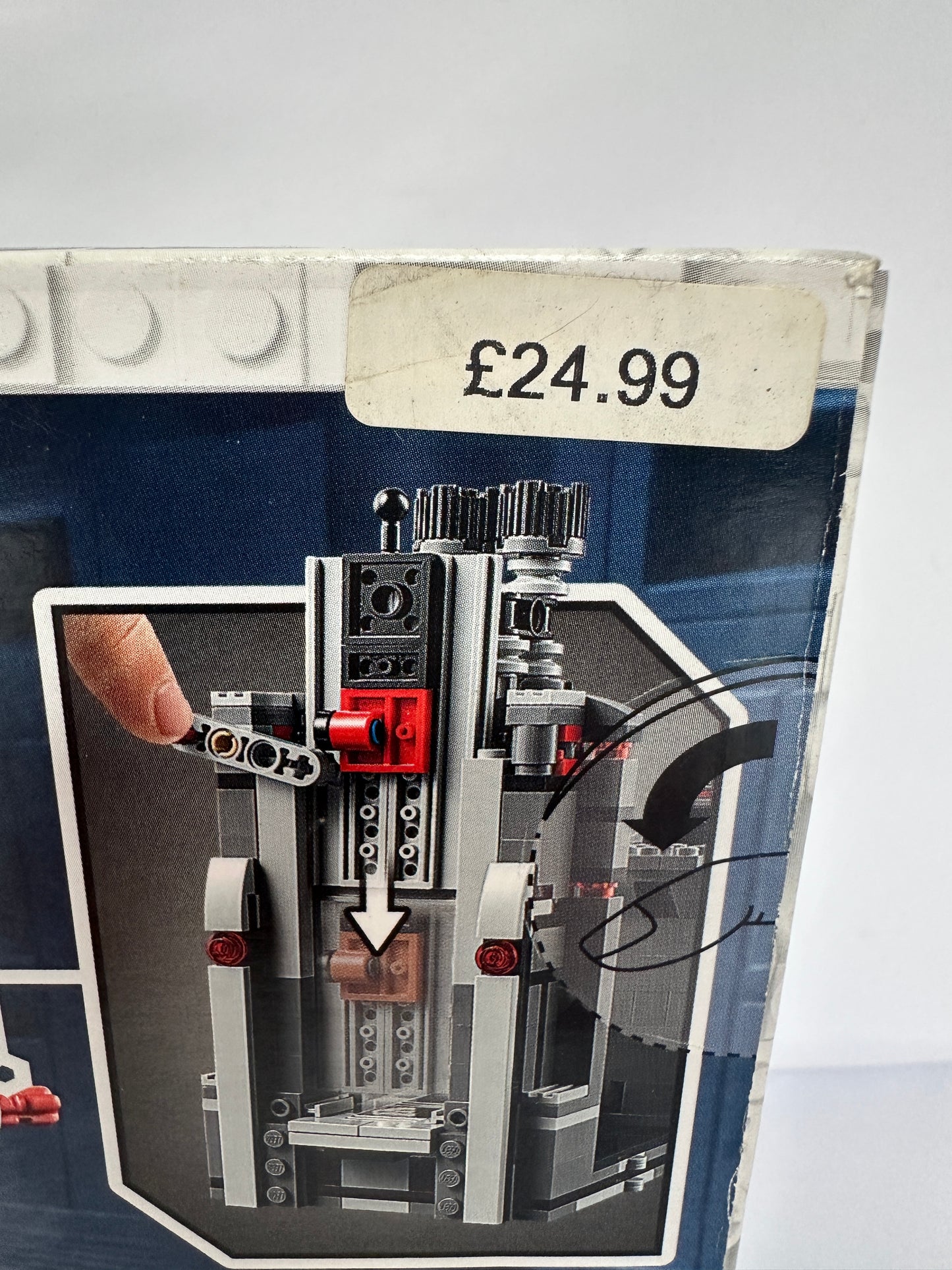 Close-up of a toy construction set with a price tag on a white background