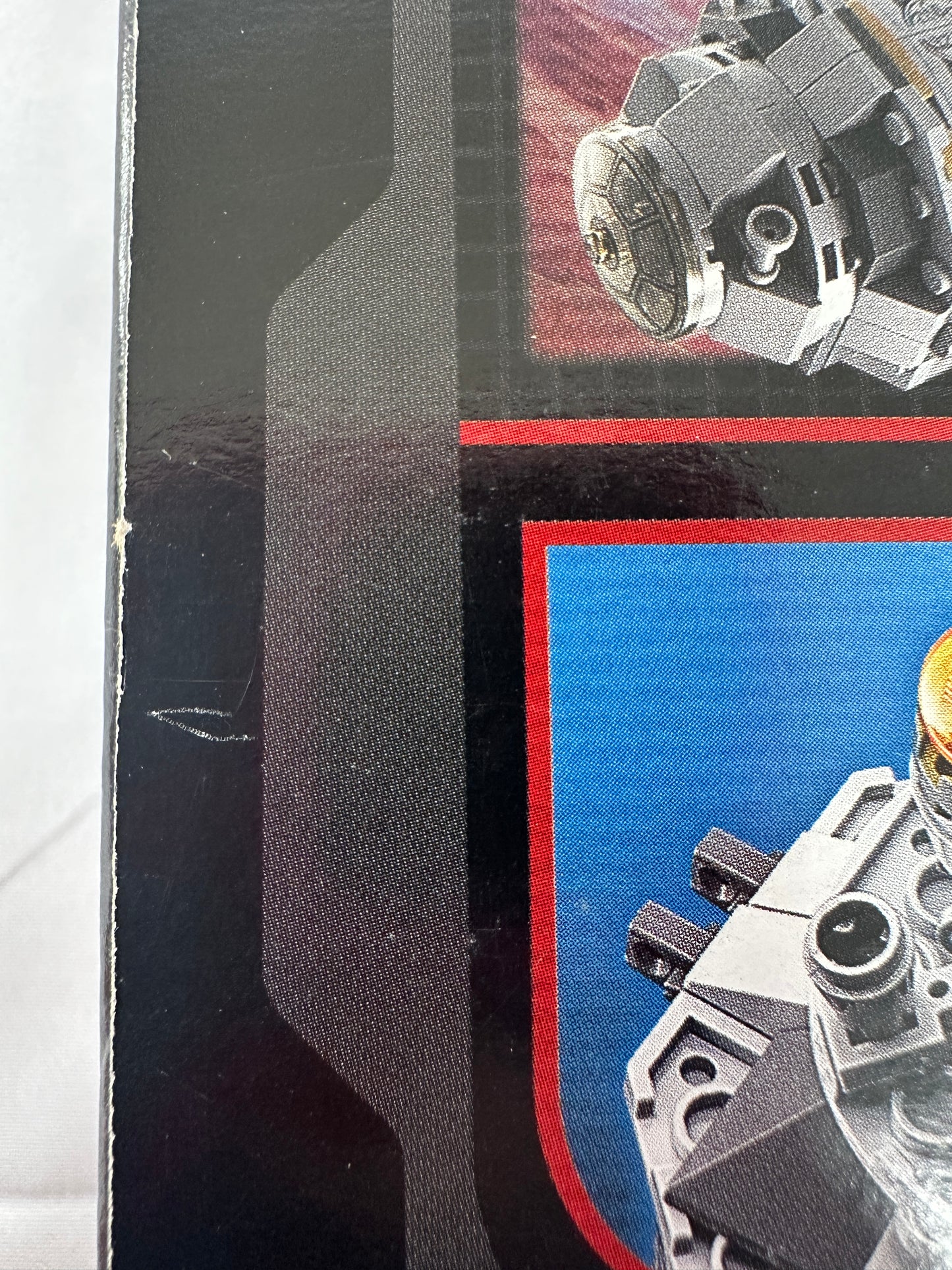 Close-up of an object with a red and blue background