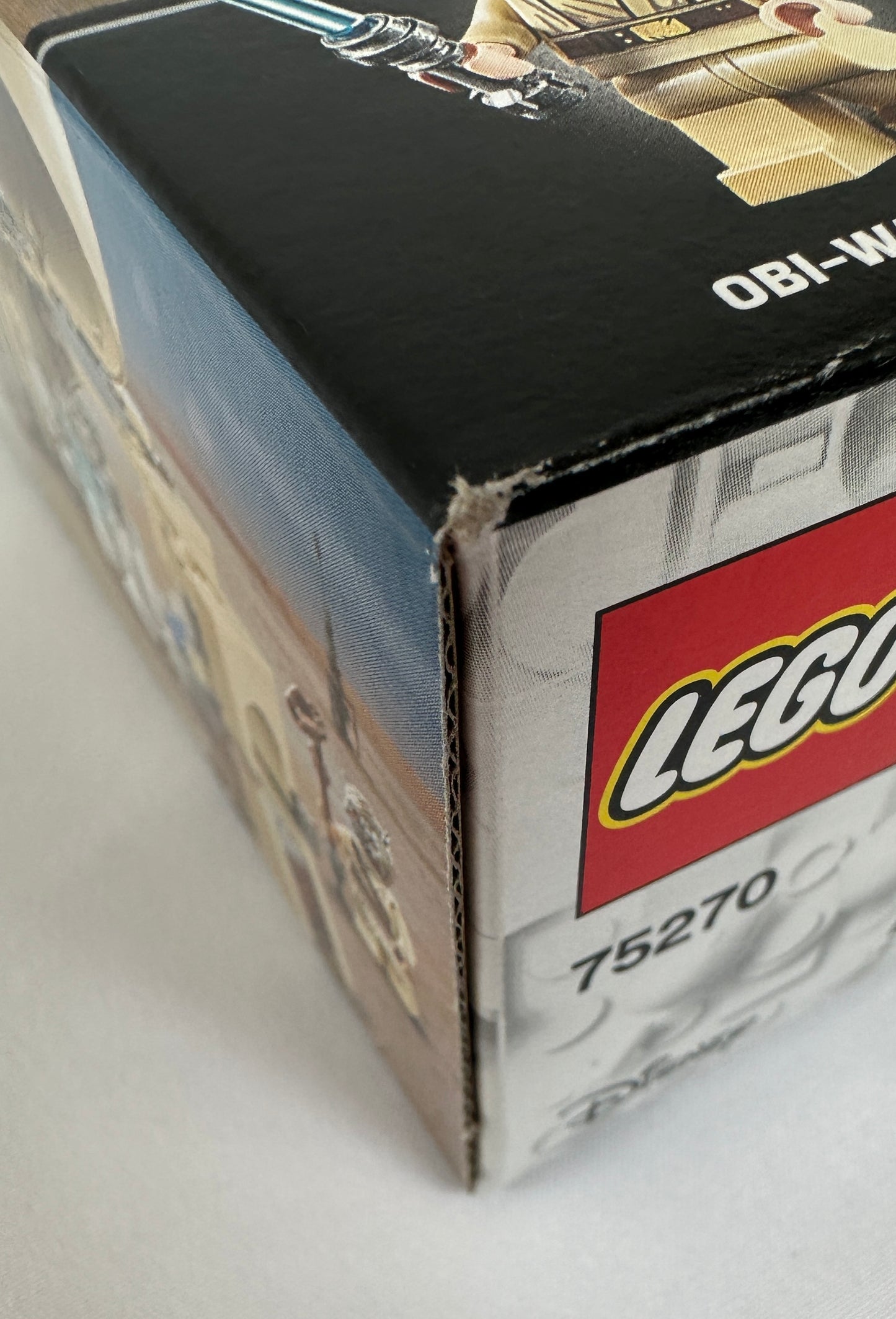 Close-up of a LEGO box featuring a character model with 'LEGO' branding.