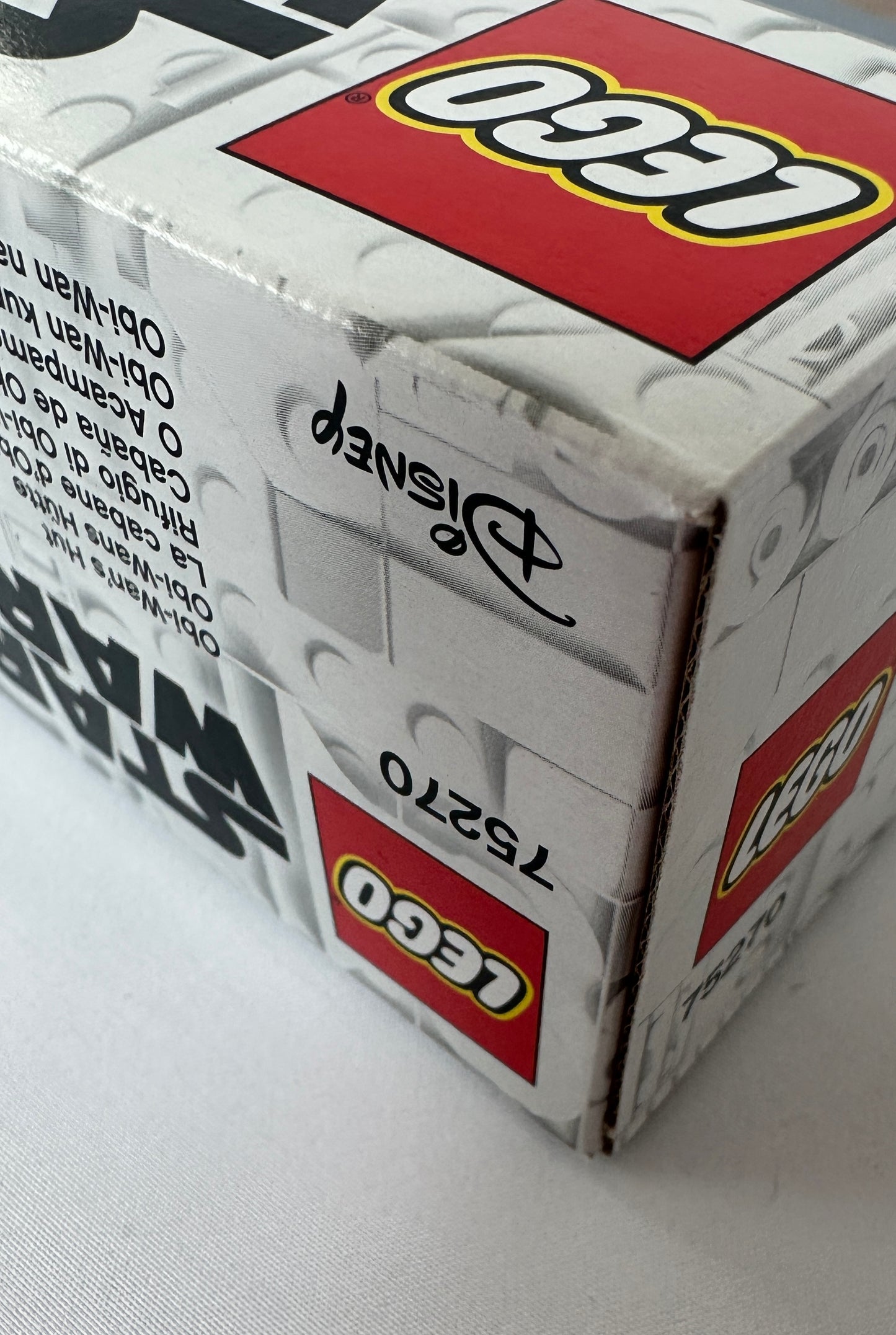 Close-up of a LEGO box with branding and product details.