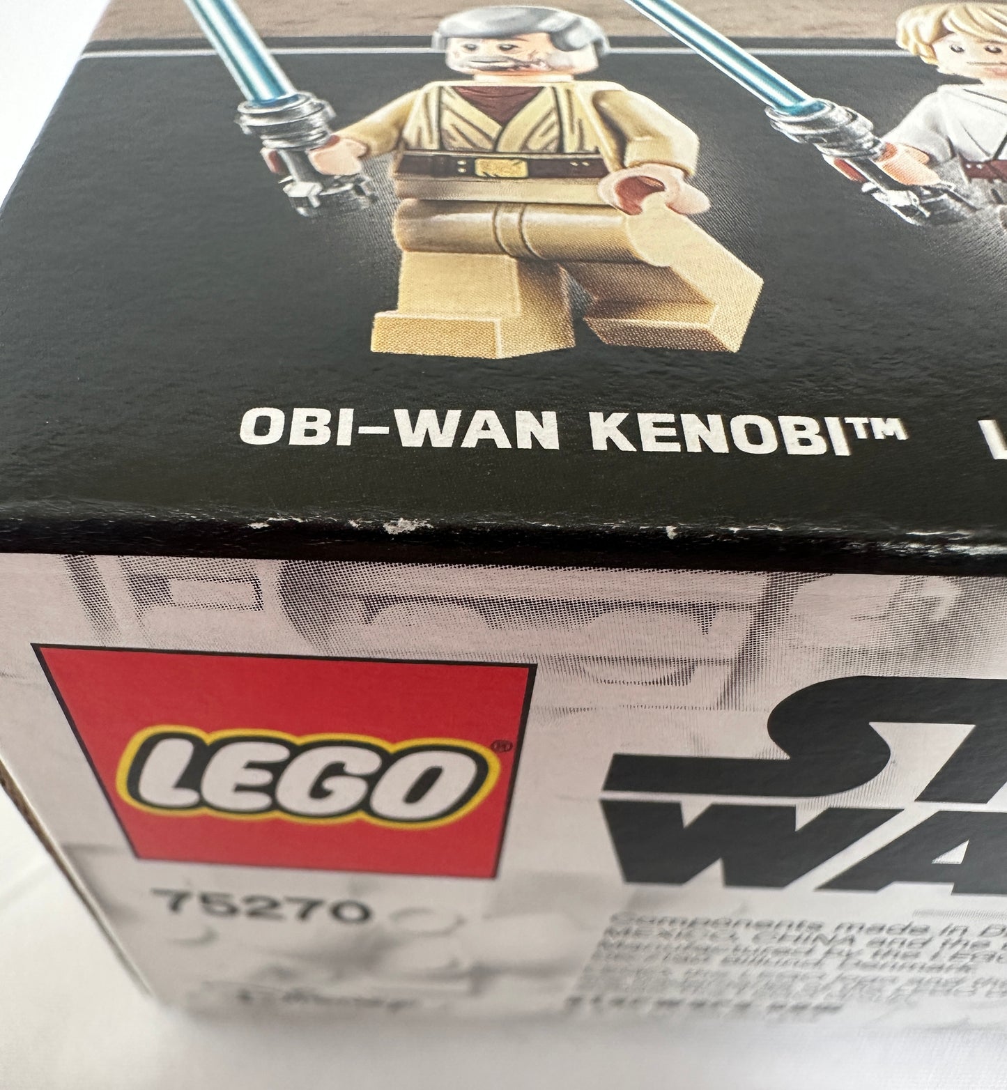 LEGO Obi-Wan Kenobi set packaging with character illustration and branding.