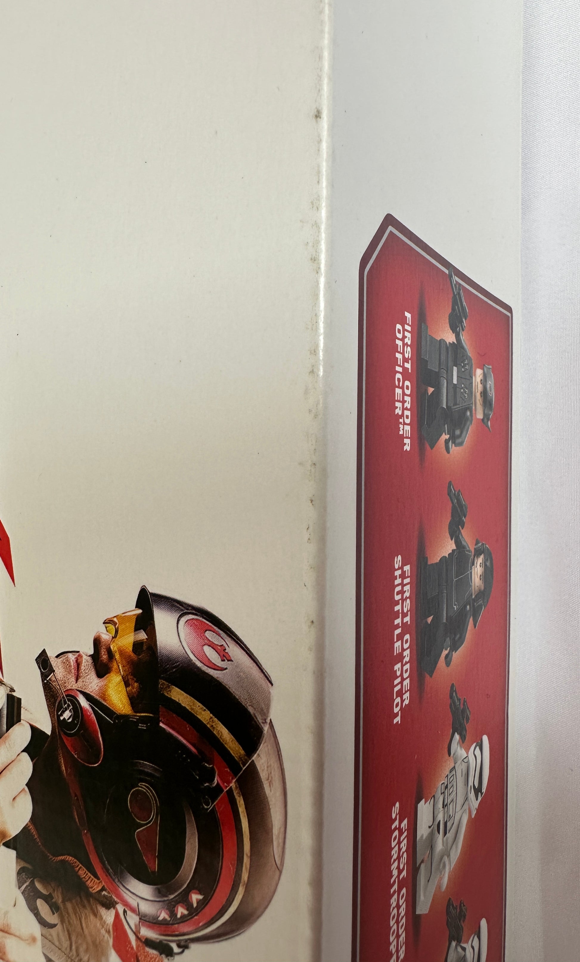 Product packaging with images of a person and a product on a red background.