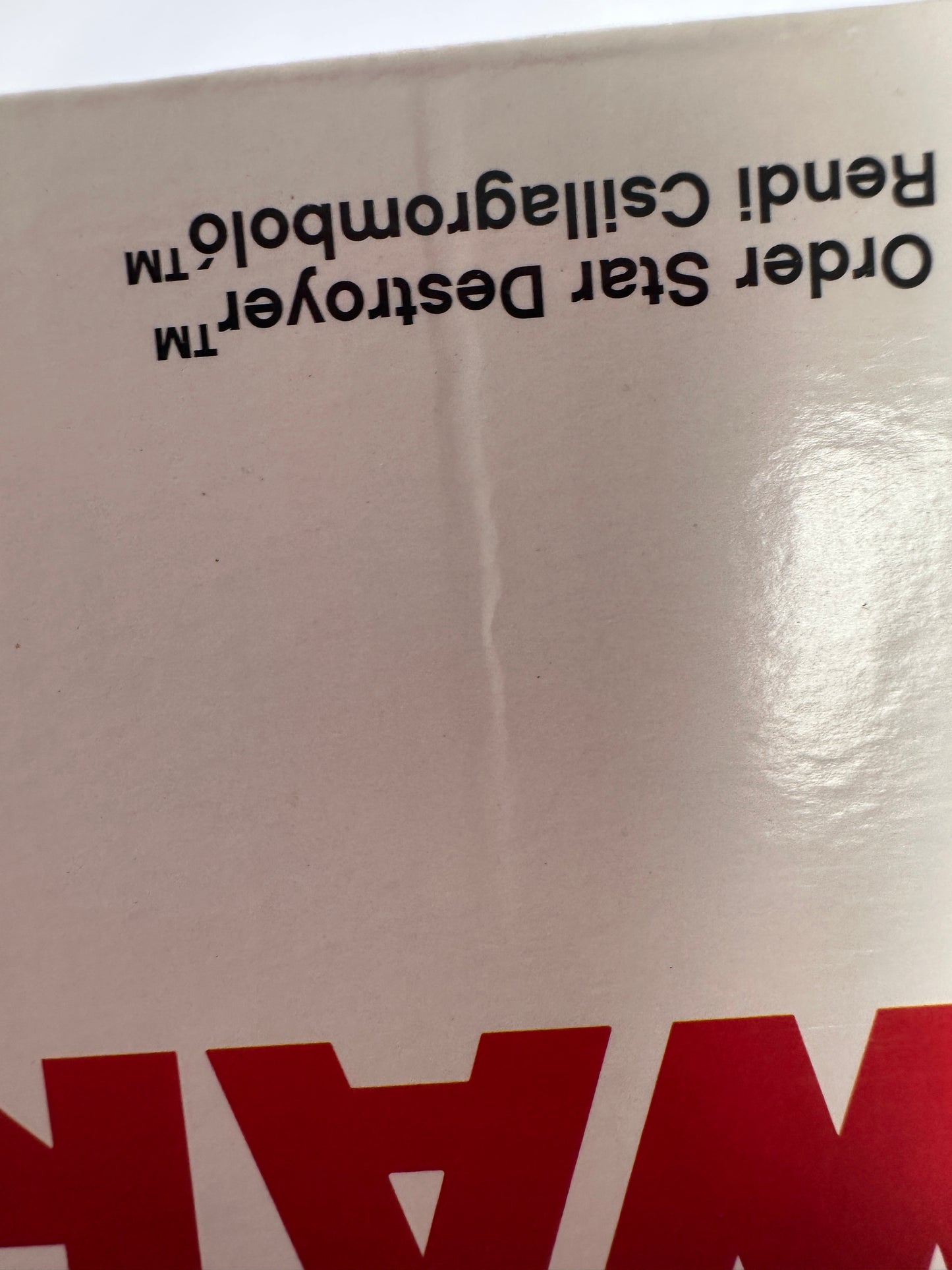 Product packaging with text and a red 'Star Wars' logo on a white background