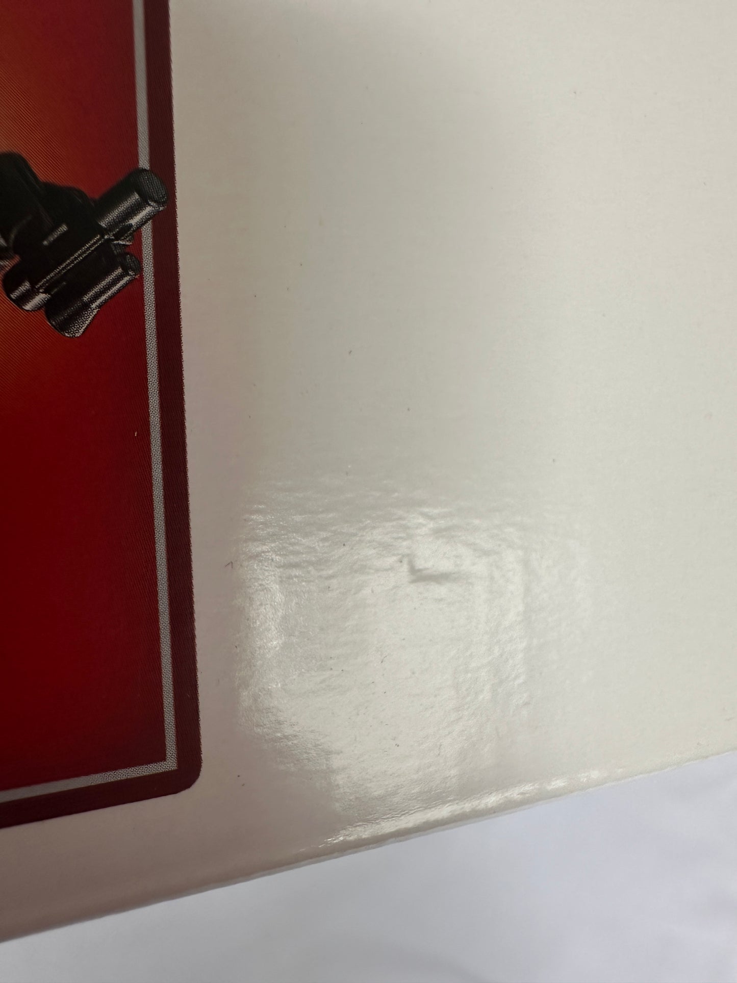 Close-up of a Lego box red and white surface.