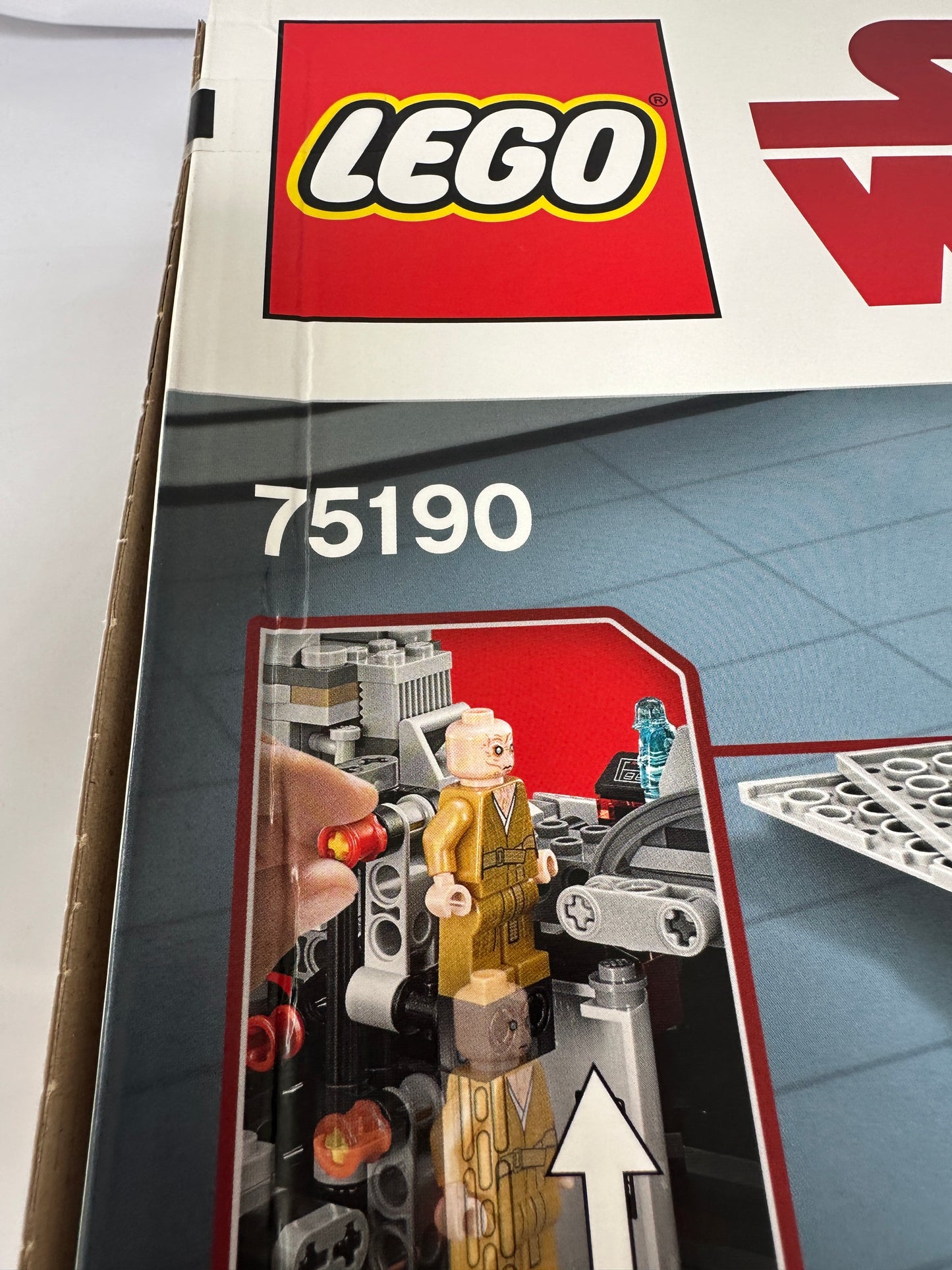Close-up of a LEGO set packaging with model details and LEGO logo.