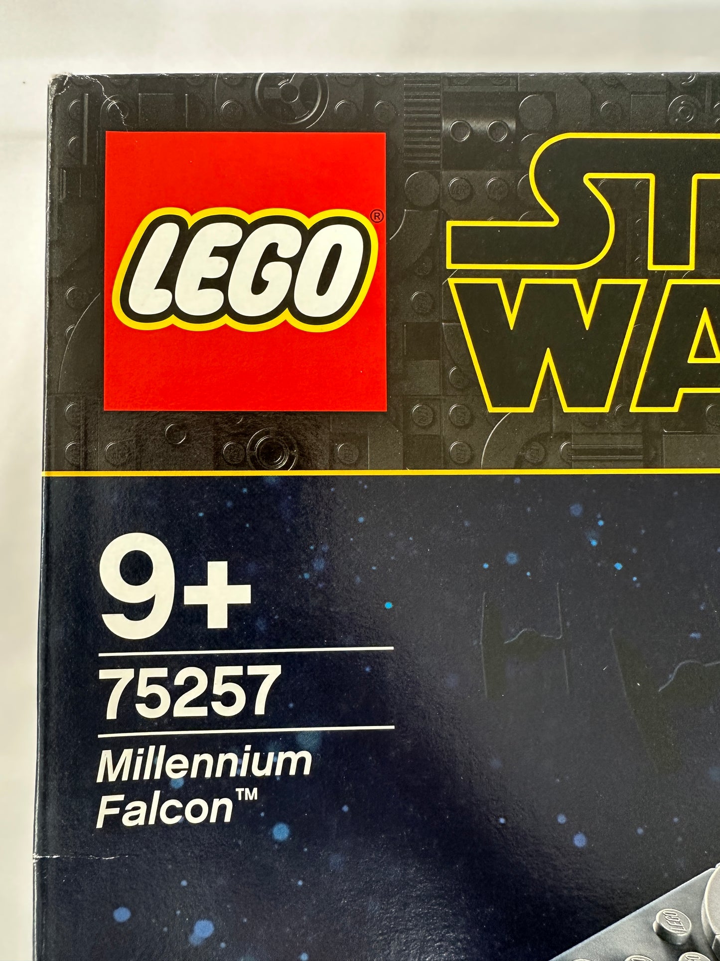 LEGO Star Wars Millennium Falcon set packaging with branding and product number.