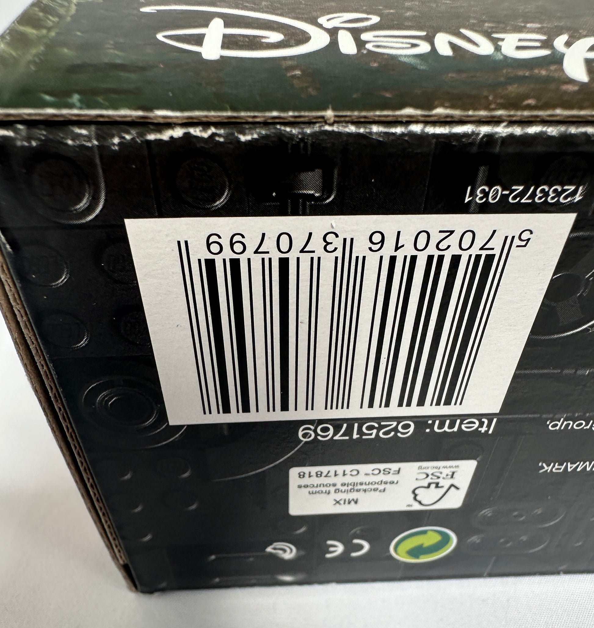 Close-up of a LEGO box with a barcode and Disney branding.
