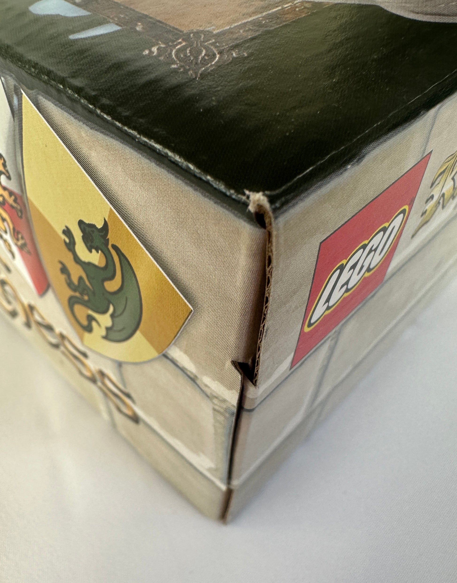 Close-up of a LEGO box corner with branding visible