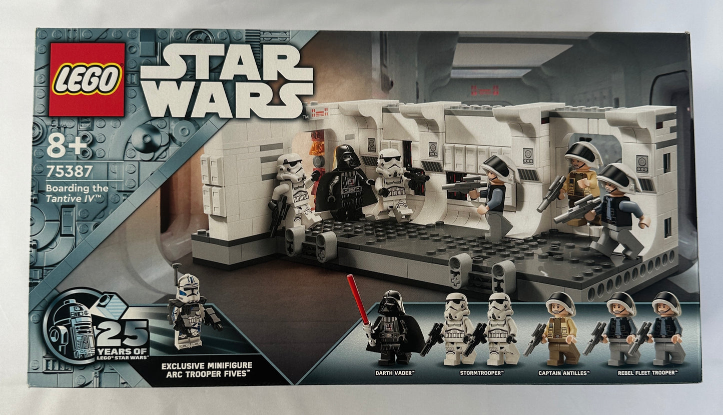 LEGO Star Wars set packaging with characters and vehicle on a gray background