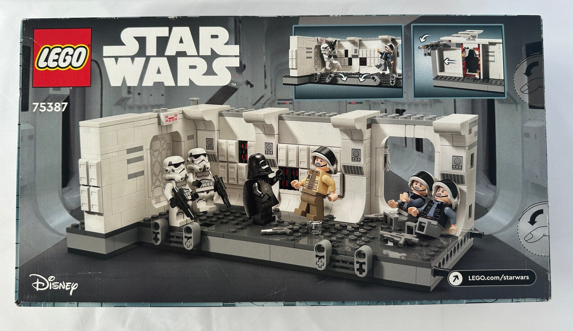 LEGO Star Wars set packaging with characters and architecture.