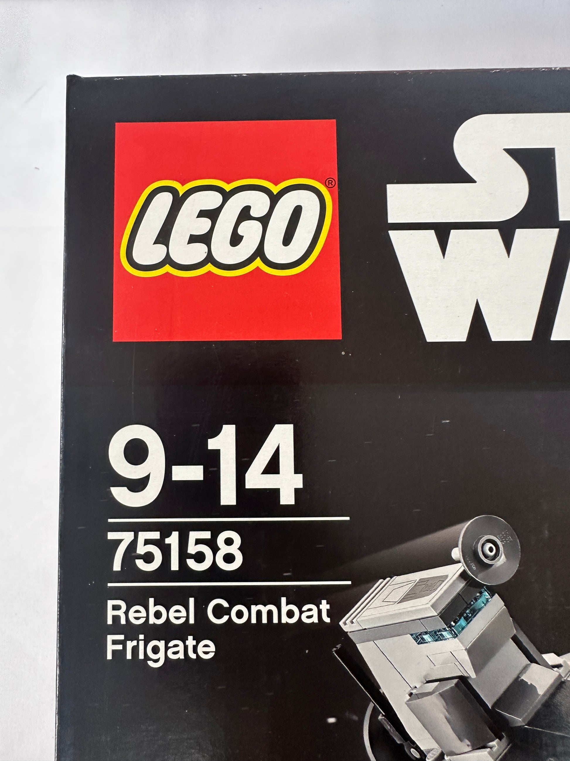 LEGO Rebel Combat Frigate packaging with model number 75158 on a black background